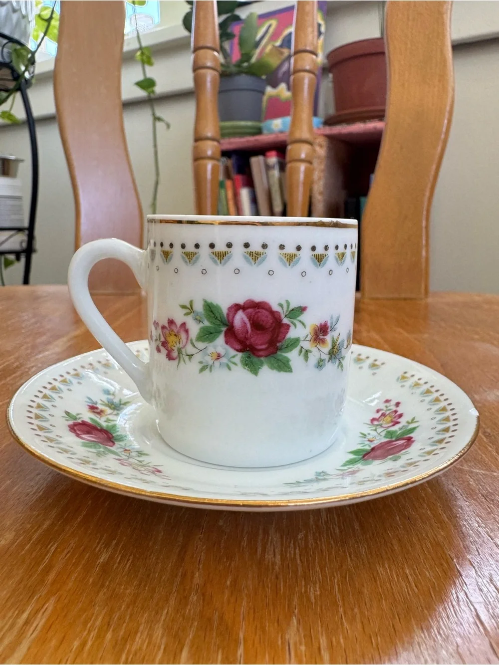 Vintage Espresso Cup and Matching Saucer. White Porcelain with Floral Motif.